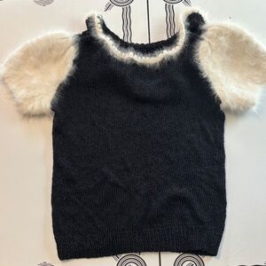 Black knit sweater w/ White Angora sleeve and trim on contrast